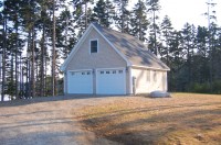 Garage Complete- We built a custom storage building for the next door neighbor as well